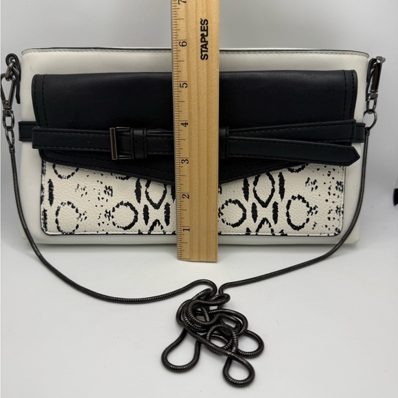 Reed Crossbody Purse Clutch featuring a removable metal chain strap Animal Print - Picture 2 of 9